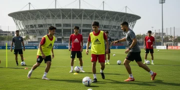 Jovens jogadores de futebol em treinamento intensivo, simbolizando o futuro do esporte e o investimento em categorias de base.